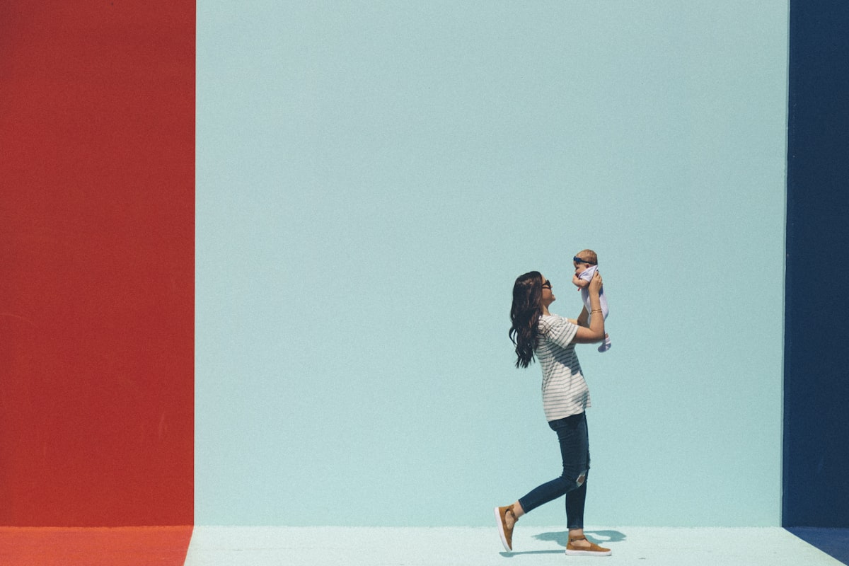 Mother holding newborn — postpartum depression treatment in Monterey, CA