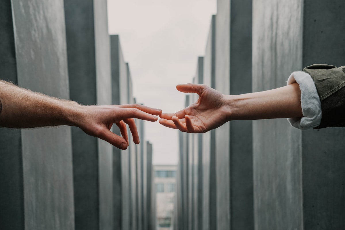 Parent and teenager having a calm conversation together — representing the importance of open communication in identifying and treating adolescent anxiety